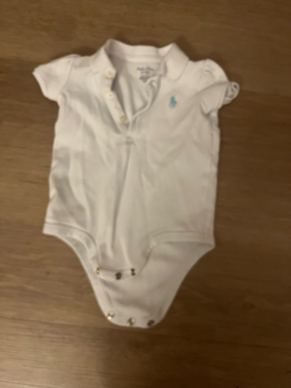 Ralph Lauren White Polo-Style Baby Bodysuit with Light Blue Logo worn 1X
